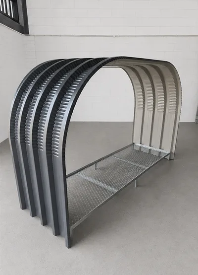 Standard firewood shed with an open front and back, showing the curved charcoal steel arch frame and galvanised mesh base